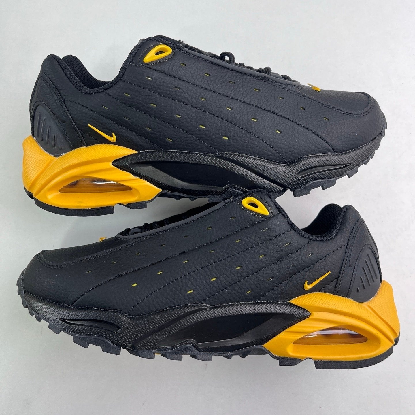 Nocta x Nike Hot Step Air Terra Black University Gold