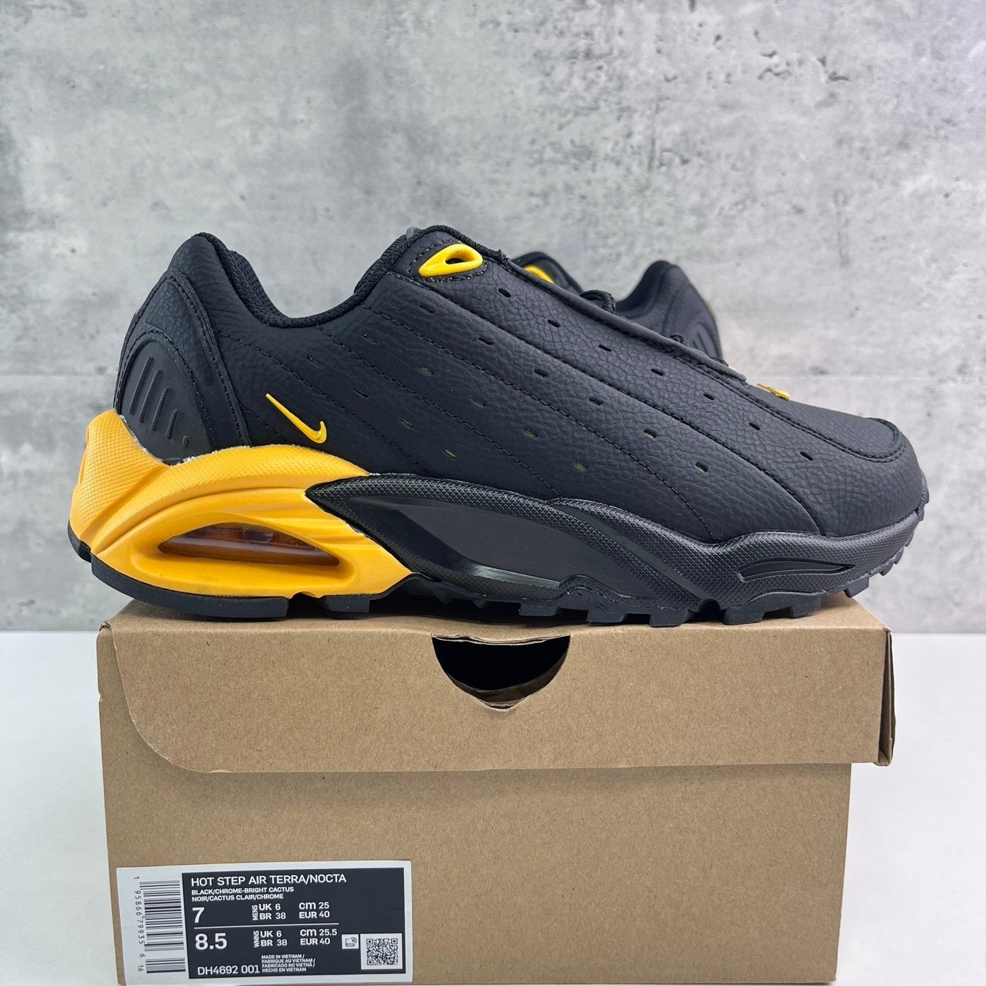 Nocta x Nike Hot Step Air Terra Black University Gold