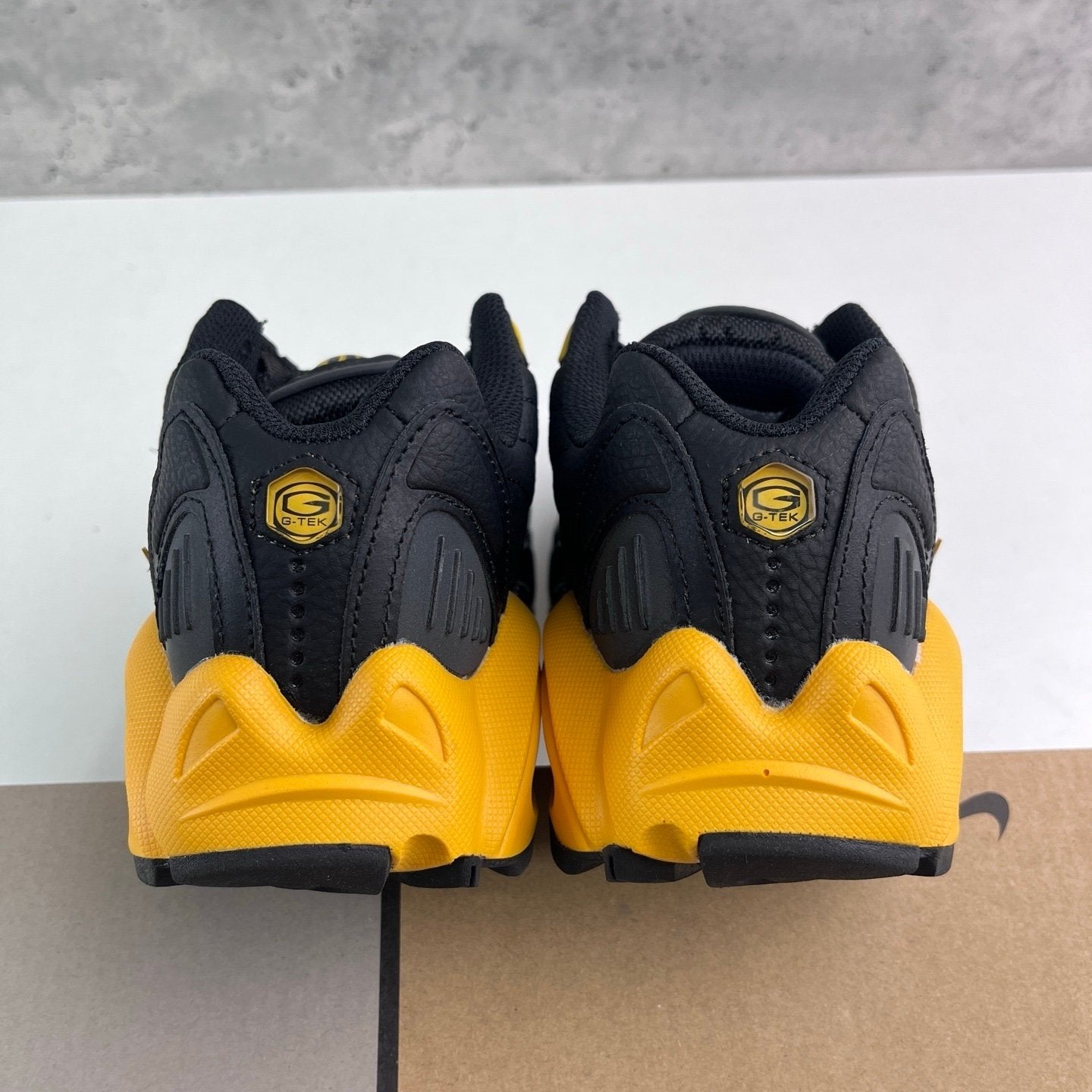 Nocta x Nike Hot Step Air Terra Black University Gold