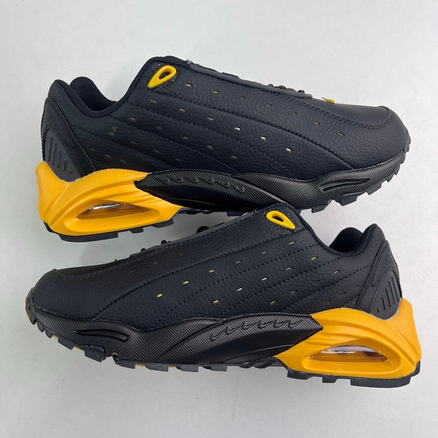 Nocta x Nike Hot Step Air Terra Black University Gold