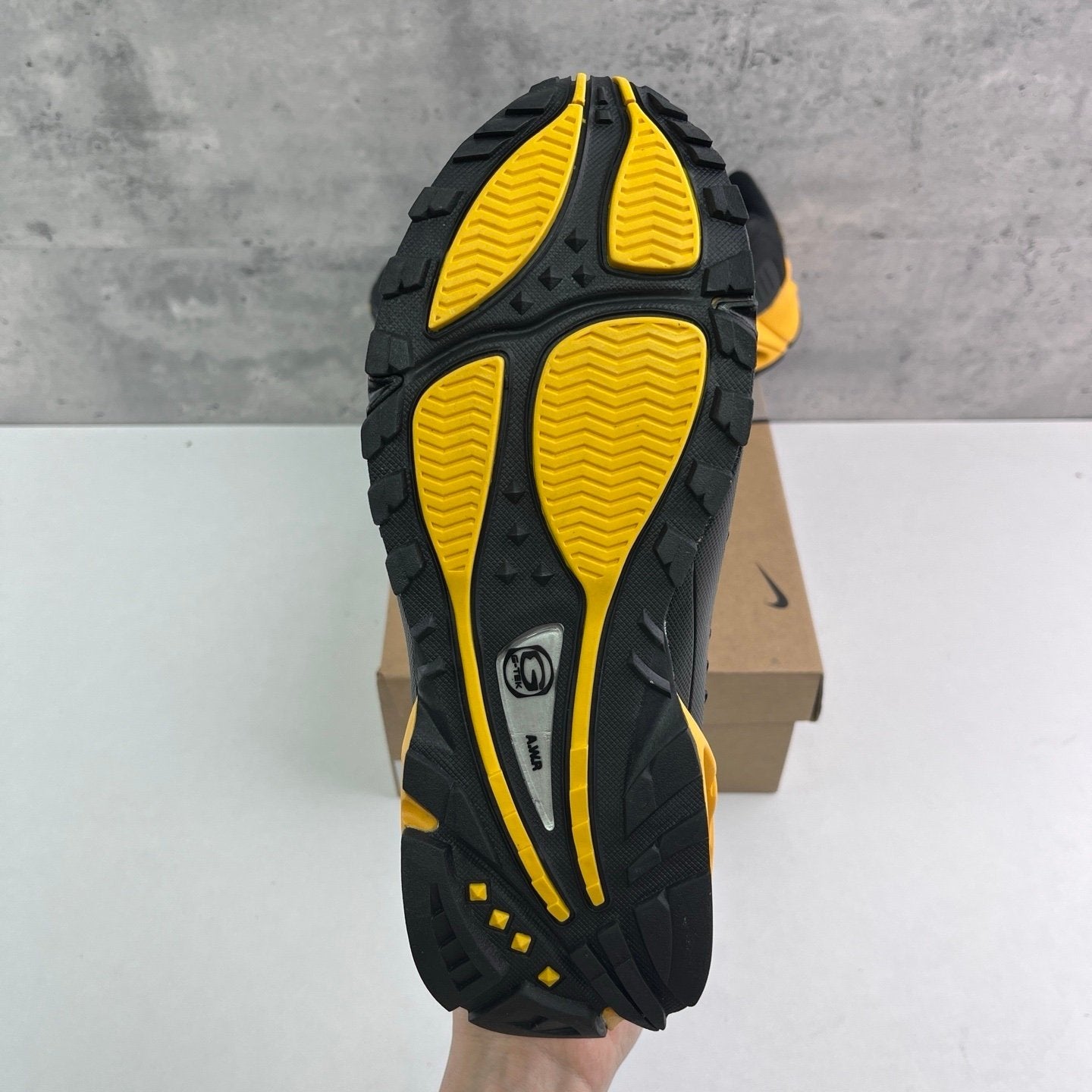 Nocta x Nike Hot Step Air Terra Black University Gold
