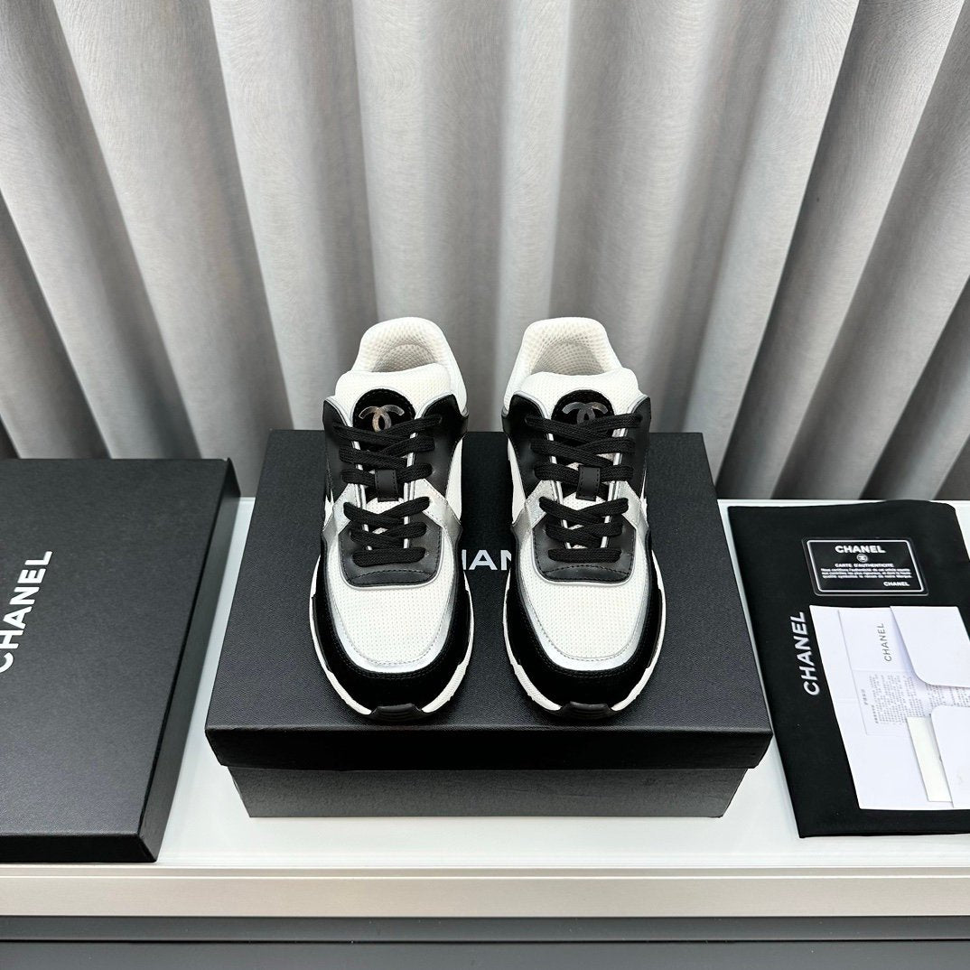 Chanel Low Top CC Trainer Black White Silver